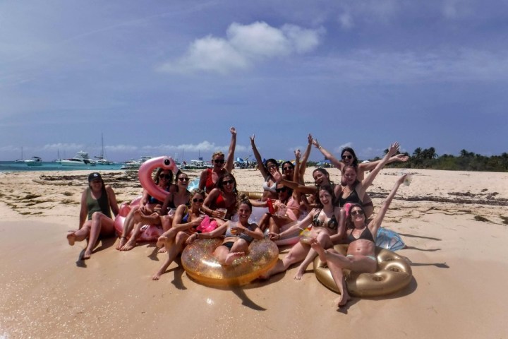 a group of people on a beach