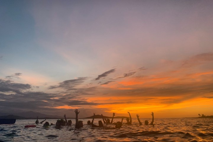 a sunset over a body of water